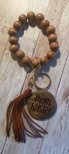 Load image into Gallery viewer, Engraved Wood Beaded Bracelet Keychain with Tassel
